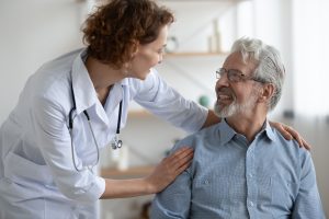 doctor talking to a patient about treatment